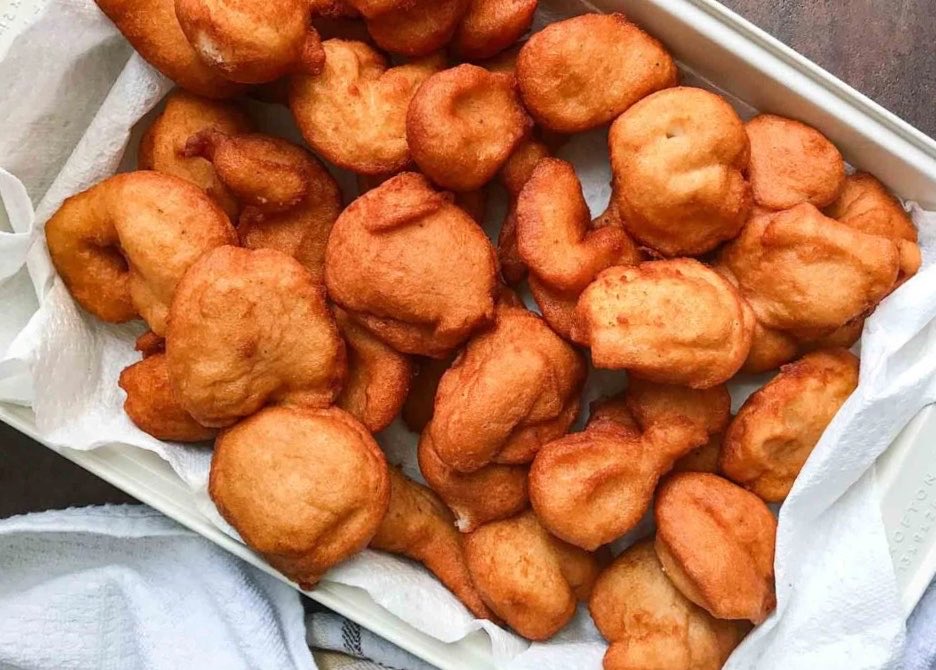 Zamani_WLK's tweet photo. Akara does not need a marketing team. It sells itself before 7am, before the oil has even settled. Ground beans, patience and fire, turned into something people will queue for under the sun and in the rain. Yoruba street food does not compete. It just wins. https://t.co/B2whA9TBnL