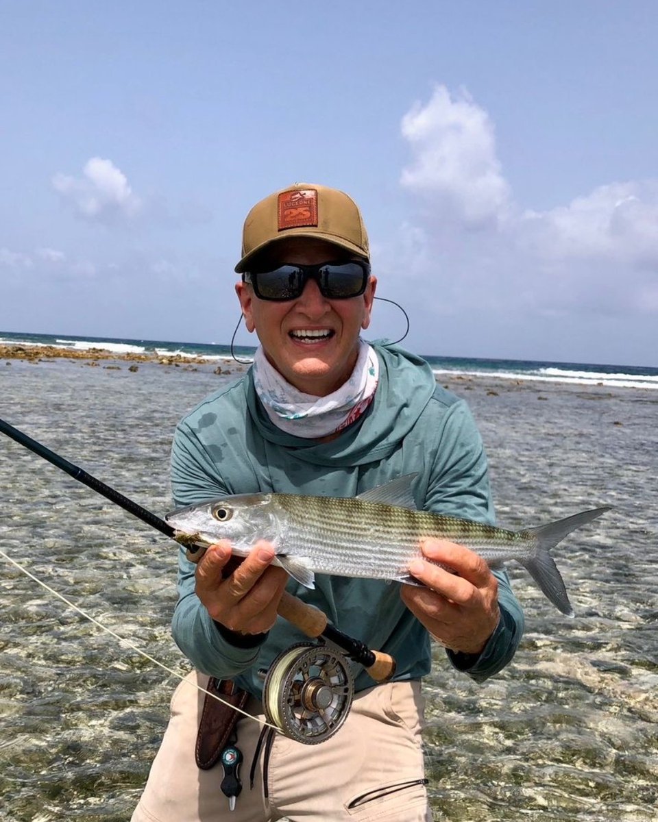 TurneffeResort's tweet photo. Kevin S. with a proper start to the week with Buddy — landing a Grand Slam on their first day out. https://t.co/O1jYeyItU6