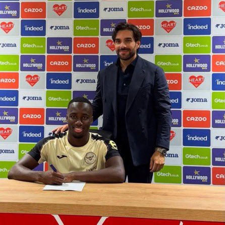 Footyxora's tweet photo. 🚨🐝 OFFICIAL: Michael Kayode signs a new Brentford contract until 2032. ✍️

“It feels like I’ve been playing for Brentford for 10 years!” ❤️

Smart decision by Brentford? 👀👇 https://t.co/YJvrq206BG