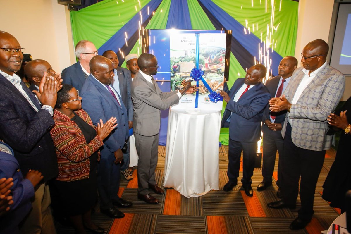 KeForestService's tweet photo. Ewaso Ng'iro Programme Launched to Strengthen Water Security and Climate Resilience 

The Kenya Forest Service Commandant, Mr. Mohammed A. Mohammed, today represented the Chief Conservator of Forests at the launch of the Ewaso Ng'iro Water and Climate Resilience Programme in Nanyuki, Laikipia County. The programme, presided over by the Cabinet Secretary for Water, Sanitation and Irrigation, Eng. Eric Mugaa, brings together stakeholders to promote sustainable water resource management, restore degraded ecosystems, and strengthen the resilience and livelihoods of communities within the Ewaso Ng'iro Basin. 

While addressing the forum, the Cabinet Secretary described the initiative as critical to the livelihoods of communities across the region, emphasizing the need to restore water catchment areas and surrounding ecosystems through the National 15 Billion Tree Growing Programme. He noted that the project will facilitate the planting of one million trees, aligns with the Bottom-Up Economic Transformation Agenda and Kenya Vision 2030, and underscored the importance of strong stakeholder collaboration to ensure its success.

Speaking on behalf of the @CCF_Kenya, Commandant Mohammed reaffirmed the Kenya Forest Service's commitment to supporting the programme, noting that the Ewaso Ng'iro River is a critical ecosystem whose restoration is essential for environmental sustainability and water security. He assured stakeholders that the Service will provide the necessary technical support and work closely with partners to ensure the successful implementation of the programme, whose overall goal is to ensure adequate water for all while enhancing climate resilience across the basin.

The Chief Executive Officer of the Water Sector Trust Fund, Mr. Willis Ombai, observed that climate change has significantly contributed to the degradation of water resources and increased weather extremes. He said the programme will work closely with the Kenya Forest Service to rehabilitate 48,000 hectares of degraded landscapes across the five counties through tree-growing initiatives, thereby improving biodiversity, conserving water resources, and strengthening the socio-economic resilience of local communities.

Among those in attendance were the PS Ministry of Water, Sanitation and Irrigation  Dr. Julius Korir,  Governors of the respective counties within the basin, representatives from the Danish Embassy, and other key stakeholders. Accompanying the Commandant were the Deputy Commandant, Mr. Wilson Leboo, the Regional Forest Conservator for Central Highlands, Ms. Monica Ndungu, and the County Forest Conservators from the five beneficiary counties.

The Commandant also took the opportunity to visit Zawadi Kakuche, a Kenya Forest Service Officer admitted in Nanyuki Cottage hospital who was wounded in the line of duty by armed bandits during the on-going multi-agency operation in Mukogodo Forest, the forest ranger is responding well to treatment.