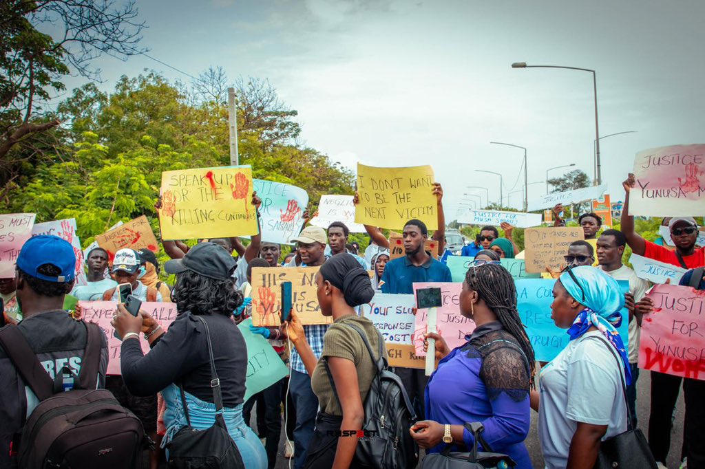 Sumaila_Fadera's tweet photo. Four weeks after Yunusa Mbaye's death, the suspect continues to make repeated court appearances while the case drags on. Yesterday, I joined fellow students in demanding an expedited legal process. Justice delayed is justice denied. #JusticeForYunusaMbaye https://t.co/RhuRtYHBIy