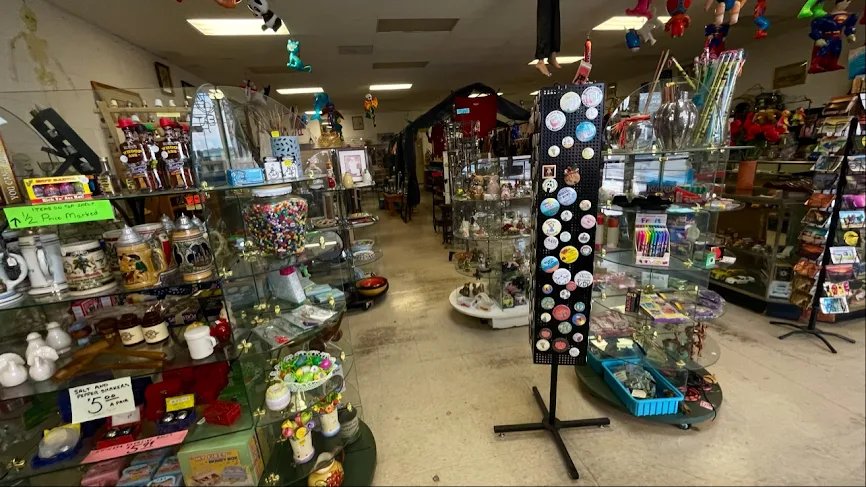 mydude_az's tweet photo. While I was out adventuring in Apache Junction, I stumbled on this awesome little shop run by one of the funniest dudes I’ve met in a while. 

His name’s Jim he’s probably in his early to mid 80s. The place is called Unnecessary Necessities, and right under the big sign it says, “If You Need It, We Don’t Sell It!”

Jim used to travel the carnival and fair circuit all over Arizona with his wife (who passed a little while back). He’s a Navy veteran. These days he can’t hit the road like he used to, so he opened this shop to keep the fun alive. It’s packed with the best kind of odds and ends Lone Ranger comic pocket knives, prank dribble glasses, leather jackets, you name it. 

Walking in feels exactly like stepping into one of those classic carnival booths… except it’s got air conditioning and Jim’s there to shoot the breeze with you.

I found the place by pure chance and I’m asking y’all to do an older guy a solid favor:  and repost this. 

Let’s get the word out so folks all over Arizona (and beyond) know about Jim’s Unnecessary Necessities.

Address:
565 W Apache Trail
Apache Junction, AZ 85119

Stop by if you’re in the area—he’d love the company.