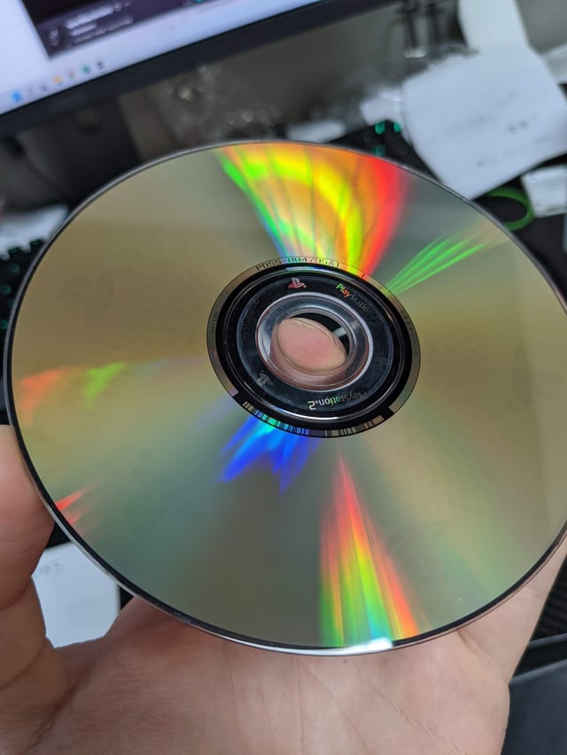 MGokaiger's tweet photo. @Troydan This is obviously fake. Disc Rot looks nothing like this. PS2 games with disc rot typically look like this. https://t.co/4HhbMAoI6J