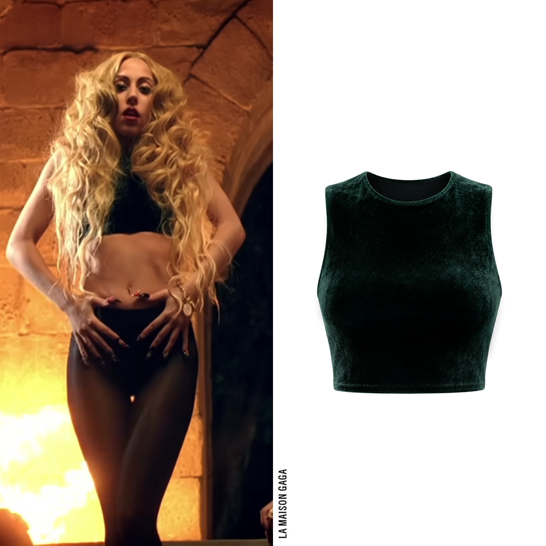 LaMaisonGaga_'s tweet photo. For the tub scene, Gaga dons a custom #PerryMeek bottle-green velvet crop top paired with @Capezio opaque tights and a @Versace bracelet (similar pictured) a Japanese little monster gave her. https://t.co/esLGKMlY7v