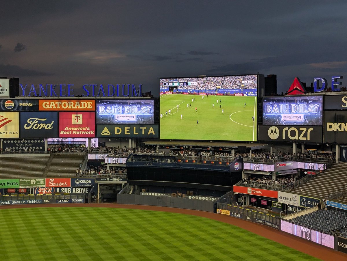 GroundwalkerL's tweet photo. Respect the fuck outta the Yankees for throwing the world cup on the big screen during this rain delay https://t.co/iFir9Wbbsf