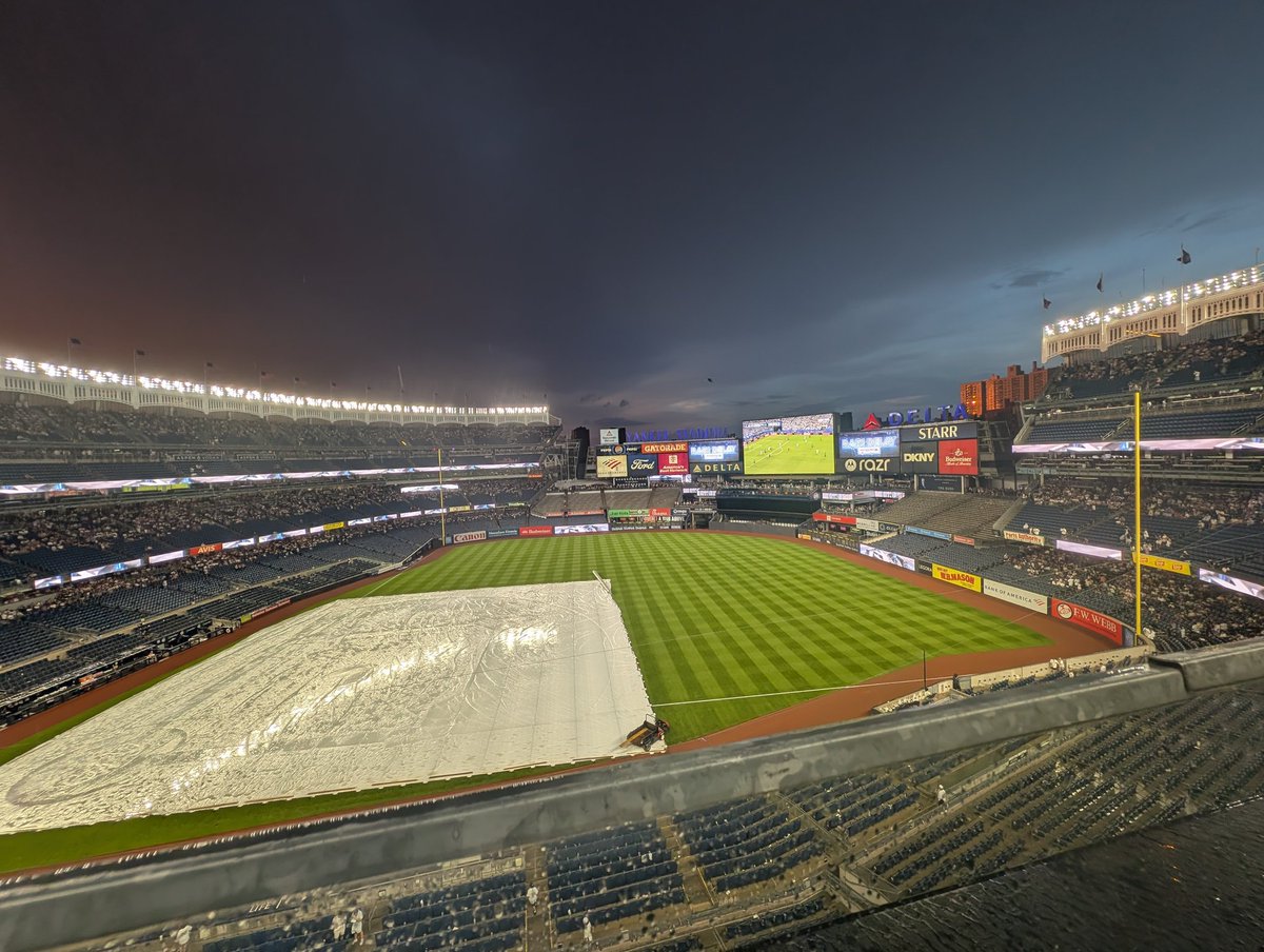 GroundwalkerL's tweet photo. Respect the fuck outta the Yankees for throwing the world cup on the big screen during this rain delay https://t.co/iFir9Wbbsf