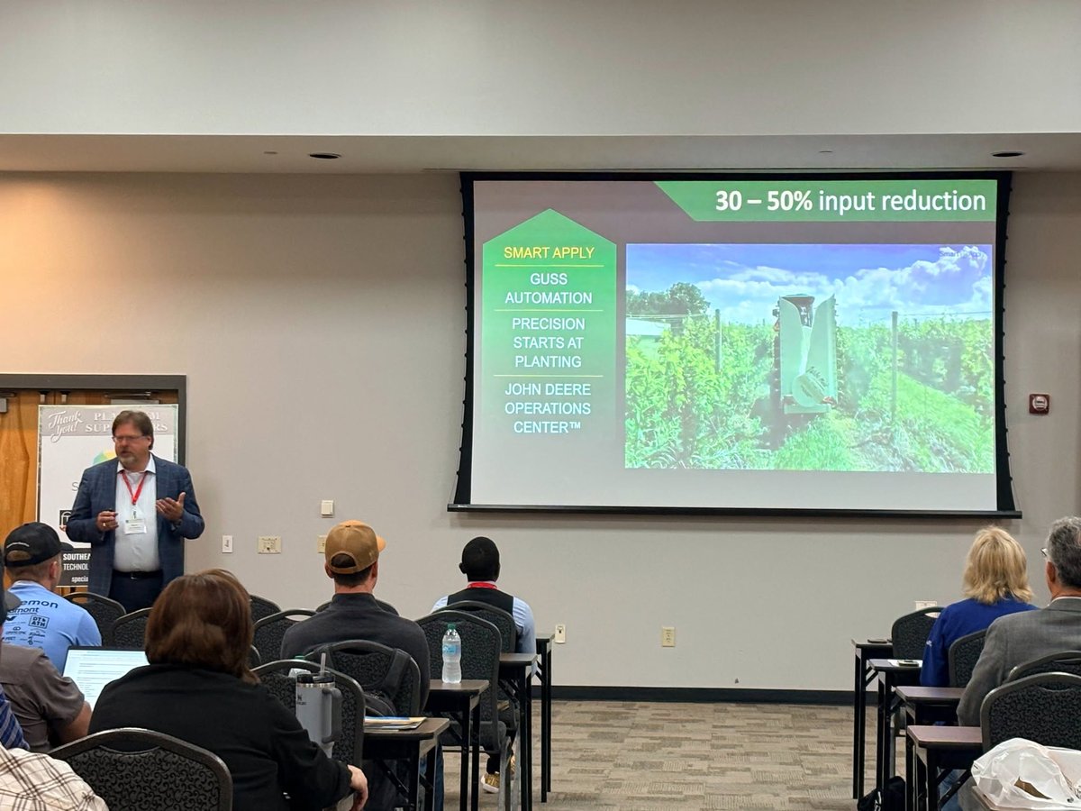 SmartApplyAg's tweet photo. 🌱🤝 Back in May, Smart Apply attended the Southeastern Specialty Crop Technology Conference & Show in Tifton, Georgia, where we connected with growers, university researchers, and industry partners to discuss the future of precision spraying.

💡 Set up in the John Deere booth, our team featured two GUSS units equipped with Smart Apply alongside our Ring-O-Fire Simulator. Throughout the event, Gary Vandenbark, Product Manager and Chief Engineer behind Smart Apply technology, demonstrated the system and presented during the conference, sharing how Smart Apply helps improve efficiency, reduce water and chemical use, and lower input costs for specialty crop growers.

📍 If you missed us in Georgia, you can still learn more about Smart Apply, connect with your nearest dealer, and schedule a field demonstration at https://t.co/ERqVx3atXu to see the system in action.

#Agriculture #PrecisionAg #HighValueCrops #SmartApply #PrecisionSpraying #AgriTech #JohnDeere