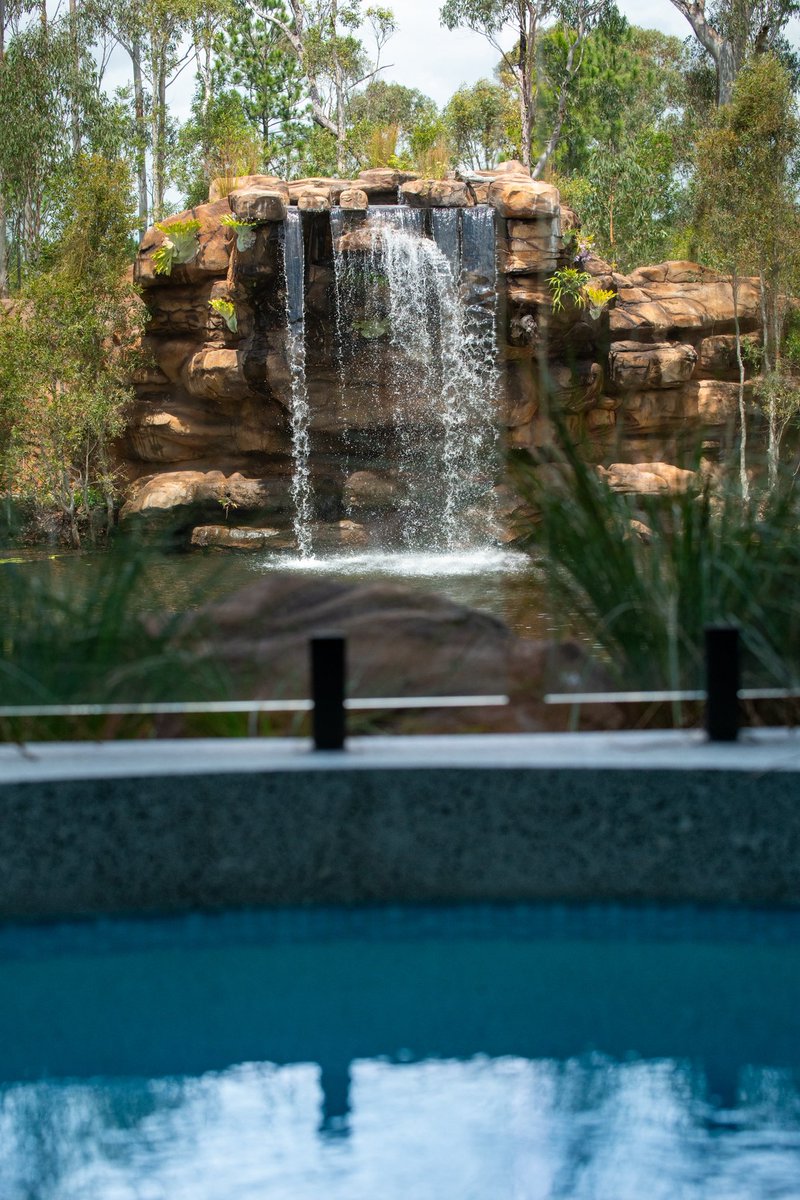 CrocHunterLodge's tweet photo. Listen to the gentle cascading of the waterfall into the freshwater crocodile pond, right from your very own Crocodile Cabin. 🐊 https://t.co/guRQ9c0WSv