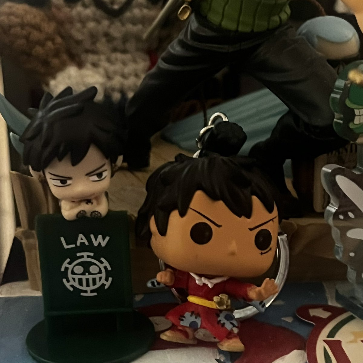 alabastace's tweet photo. new law has joined the one piece shrine https://t.co/bhZkzP756V