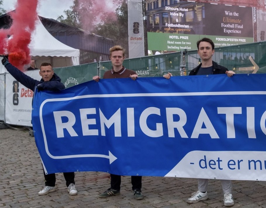 visegrad24's tweet photo. Young Danes showed up tonight at the World Cup fan zone in Copenhagen where Christian Zedig was attacked by an African gang.

They brought a banner with them saying:

“REMIGRATION” https://t.co/iU67cxl4zH