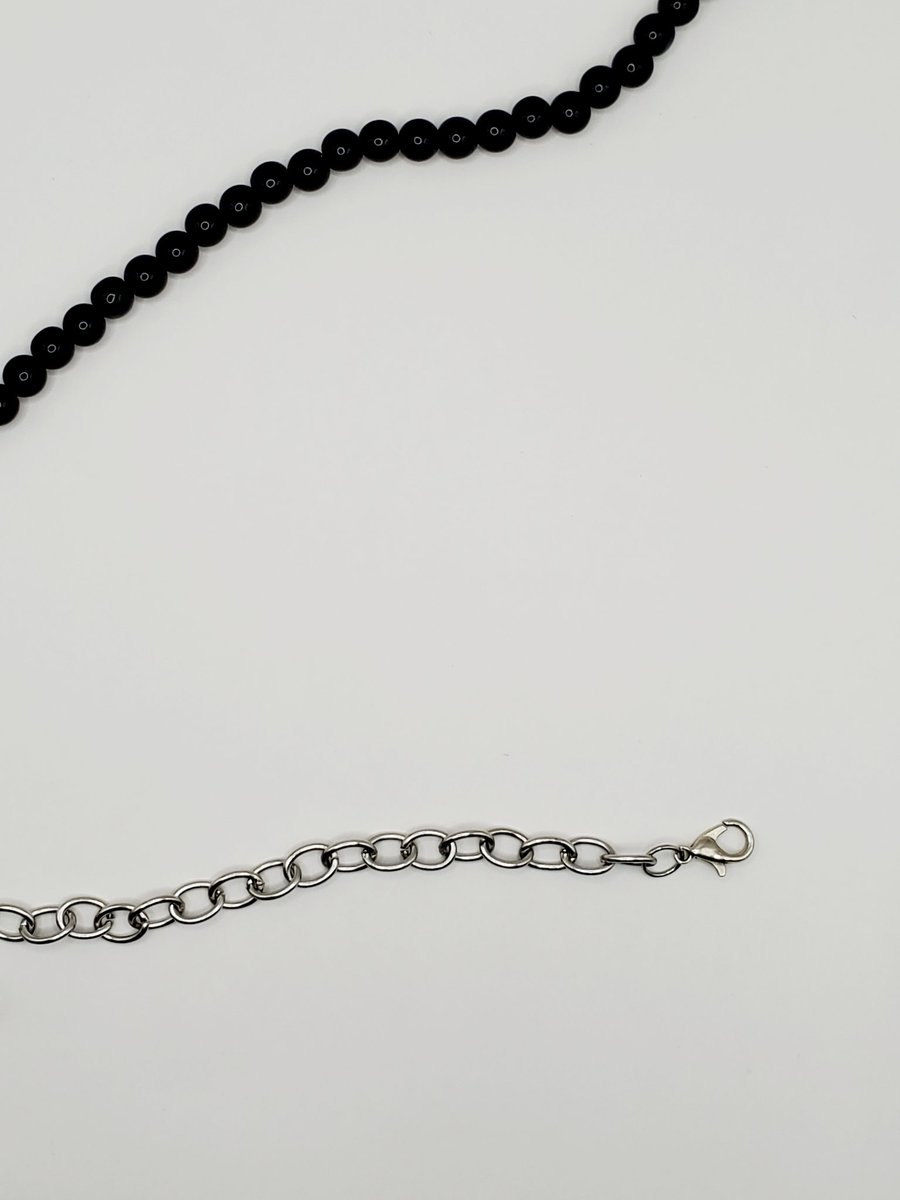 Rockstar_DuJour's tweet photo. Make a statement without saying a word. ✨ Rosela is a handcrafted black bead & silver chain necklace. Now available in the RDJewels shop! 🖤
#shopsmall
#handmadejewelry
#jewelry
#smallbusiness
#handcrafted
#blackandsilver
#necklace
#statementjewelry
#minimaliststyle https://t.co/4JTCd48fV1