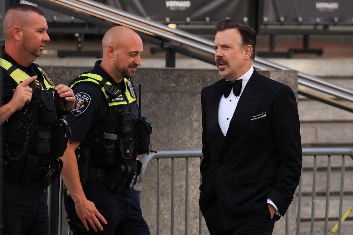ThoughtCatalog's tweet photo. In June 2024, Jason Sudeikis got on stage at a Kansas City charity weekend and asked Travis Kelce when he'd make an honest woman out of Taylor Swift. Two years later, he showed up to the answer — arriving at MSG for their wedding, reportedly the arena's first private event in 44 years.