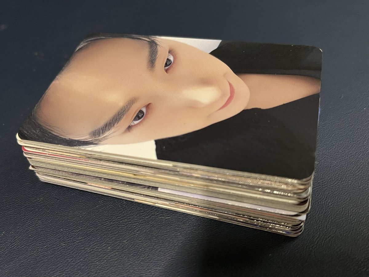 yeosfleur's tweet photo. finally putting the huge scary pile of ateez photocards away in a binder who else cheered https://t.co/zXmfBnGCIa
