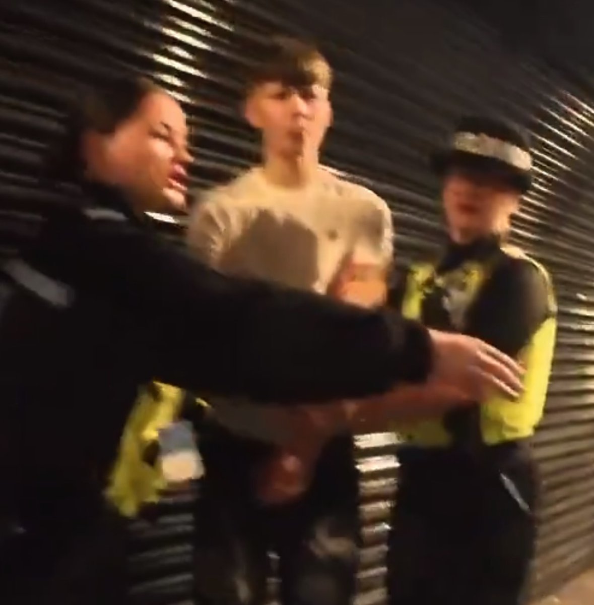 Riding2Remember's tweet photo. This is @brumpolice arresting a drunk kid who had just been attacked (as they watched) by four dark people. They are pathetic. https://t.co/VVz7u9CKyP