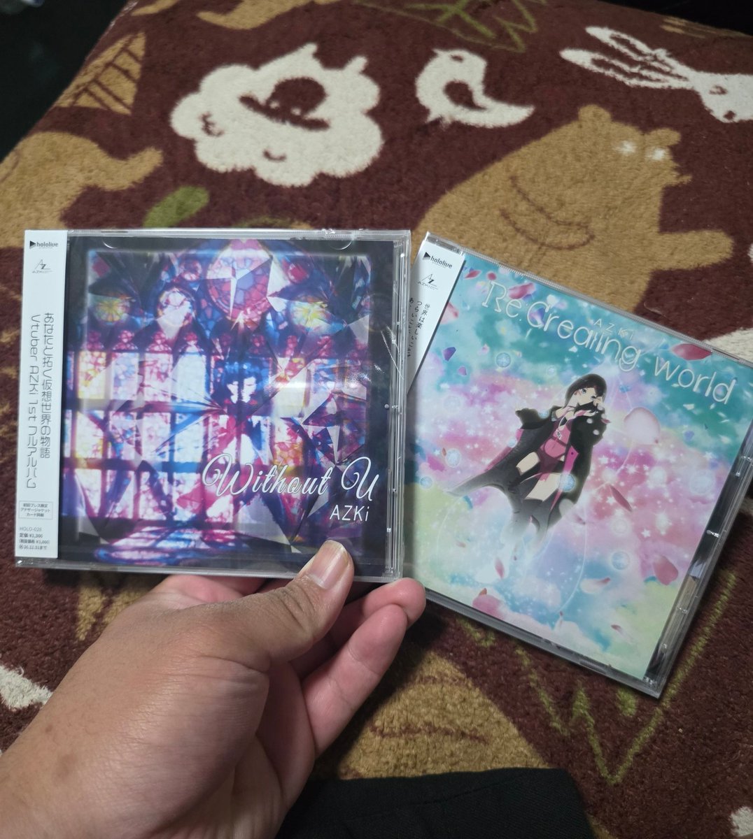 asamiya1117's tweet photo. ついに届きました
ずっと欲しかった2枚、こうして手に取る事はできないと思いましたが、今ここに確かにあります
名曲しかない神アルバム、大切に聴きます🙏
ジャケット最高すぎる…😇
(追加分も後々届きます)
#あずきち届いたよ https://t.co/i7GIseGVkS