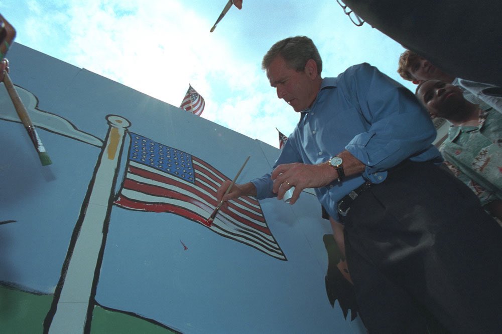 TheBushArchive's tweet photo. President George W. Bush painting an American Flag on July 4th 2001 https://t.co/gTv5fgiHtN