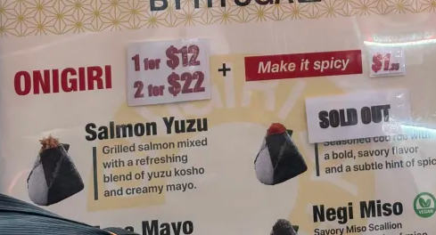 cillia's tweet photo. Friend at AX sent me pictures of food prices and even as a California resident who is used to insane prices, I think $12 for 1 onigiri is insane LMAOOOO https://t.co/axlOIpkahP