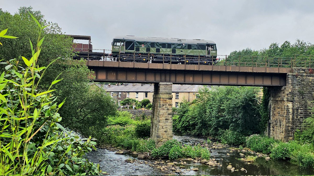 Harrod15S's tweet photo. D5054 (running now as D5053) crossing the River Irwell at #Summerseat working a mixed freight on day 2 of the #ELR summer diesel gala 3/7/26 #class24 #trains https://t.co/NhSeO0RvsM