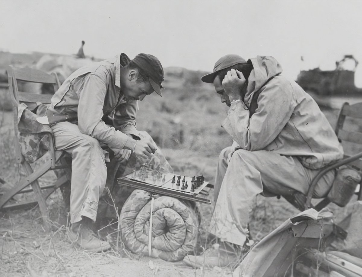 olimpiuurcan's tweet photo. A 1945 photograph of two American marines at an airfield in Iwo Jima. https://t.co/1jjUlbaxSu