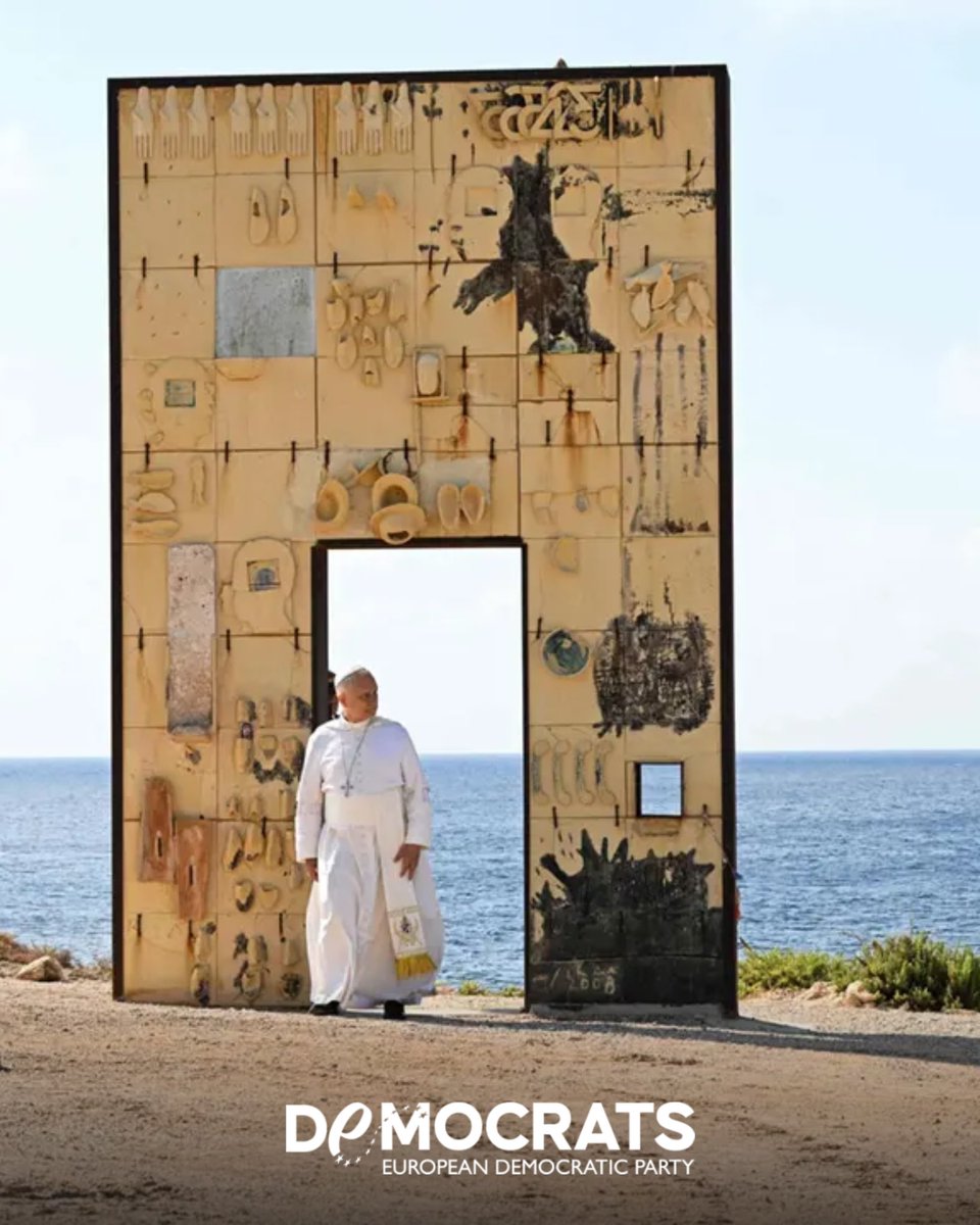 democrats_eu's tweet photo. On America’s 250th Independence Day, the first US-born Pope chooses Lampedusa’s Porta d’Europa: not a palace, not a parade, but the shore where Europe sees itself. The message is impossible to miss. Freedom is not a flag to wave while people drown. It is a duty to protect dignity, to save lives, to manage migration with humanity and order. As European Democrats, we choose secure borders — and humanity that does not turn away.