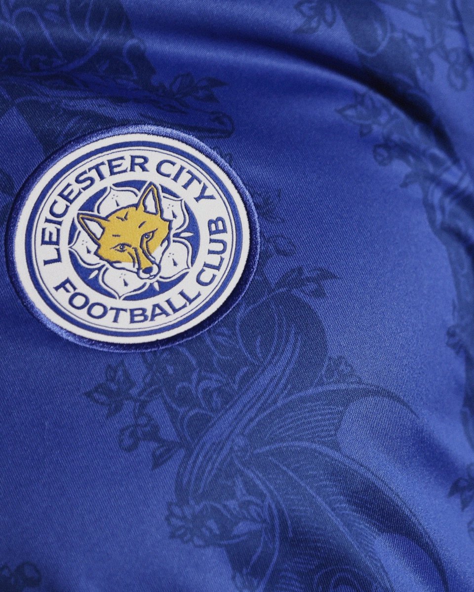 LCFC's tweet photo. From atop a Leicester Fosse cinquefoil in the 1890s to our 26/27 threads 🧵

The historic wyvern is woven into the fabric of our new home shirt, drawing on a symbol that has long been part of Leicester’s story.