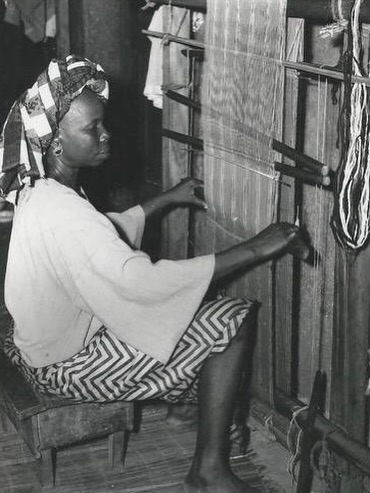 ifejournal's tweet photo. Aso-Oke is a short form of Aso Ilu Oke, also known as Aso-Ofi, meaning clothes from the up-country. It is the traditional wear of the Yoruba and is worn on special occasions, usually for chieftancy, festivals, engagement, naming ceremony and other important events.  

The cloth weaving started centuries ago amongst the Yoruba but predominantly amongst the Iseyin’s (Oyo State), Ede (Osun State) and Okene (Kogi State). The fibres used for weaving are either locally sourced or brought from neighbouring states in the Northern parts of the country. Women were exclusively responsible for harvesting, ginning, and manually spinning cotton, as well as extracting natural dyes from indigo and camwood. And while the men traditionally used horizontal narrow-strip looms, the women worked with vertical looms (òfo) to create broader single-panel cloths.  

Aso oke cloth is decorated with elaborate patterns created by dyeing strands of fabric and weaving them into strips. These strips of cloth are sewn together to form larger pieces. Some Aso oke cloth, called “prestige cloth,” has a lace-like appearance with intricate open patterns.