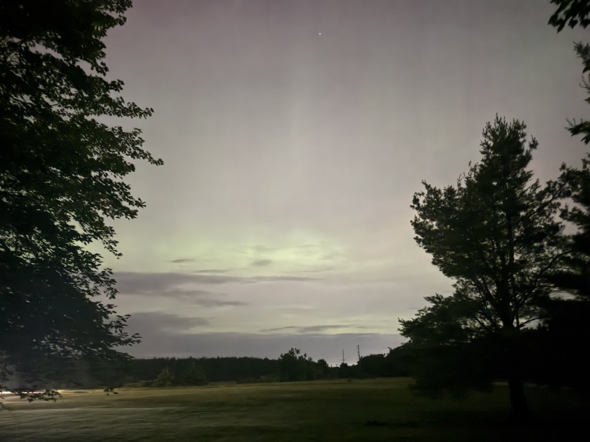 NWSGaylord's tweet photo. 🇺🇸🇺🇸🇺🇸 As we begin the early hours of the 250th anniversary of our nation's independence, it appears as though solar activity wants to grace us with the northern lights. There are clouds around (see picture), but if you're lucky enough to be in a clearer area... LOOK NORTH! #MIwx https://t.co/G5qfUPg41M
