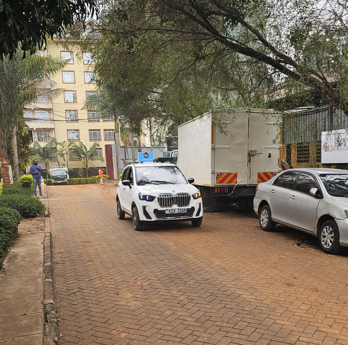 Kalasinga_'s tweet photo. My cab today is a BMW. This contraption should not be on the road. You literally hear the body panels squeak as you drive on even the smoothest of tarmac. https://t.co/9ru2d36GxO