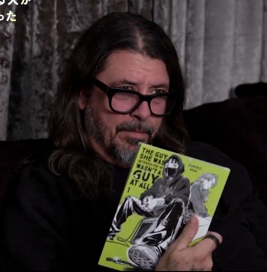 bluemitsuaya's tweet photo. if you told me 3 years ago that in 2026 id see DAVE GROHL holding the green yuri manga and saying kurt wouldve loved it.. i would've laughed in your face https://t.co/jDZstpqKR8