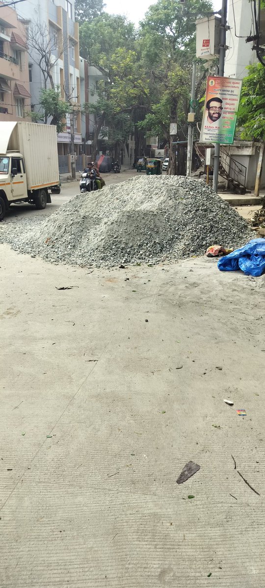 deependrasp's tweet photo. Contractor has illegally dumped sand and gitti (gravel) right on the road, completely blocking traffic and creating a severe safety hazard. @DKShivakumar @krishnabgowda  at prof UR Rao Road cambridge layout. https://t.co/tY1zQdDS1y