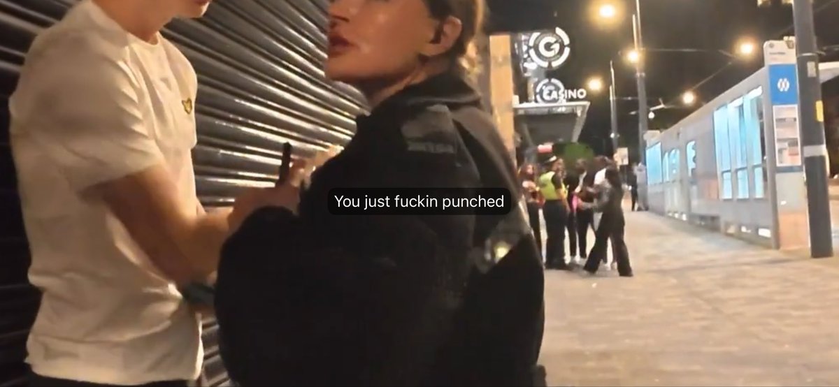 chazzypoos's tweet photo. @DonnaDlm71 They’re now asking for help identifying the individuals who assaulted him.   Perhaps speak with the officer who is literally having a chat with them in the background? https://t.co/ZgmsKuzG4i