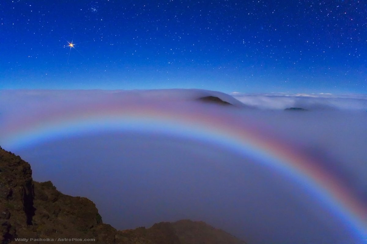 astropics's tweet photo. Did you know that rainbows can also form at night? 

This is the lunar rainbow or "moonbow".
It appears thanks to moonlight reflected by drops of water in the air, often near a waterfall or under a clear full Moon.

Rarer and paler than a classic rainbow, because the Moon is less bright than the Sun.