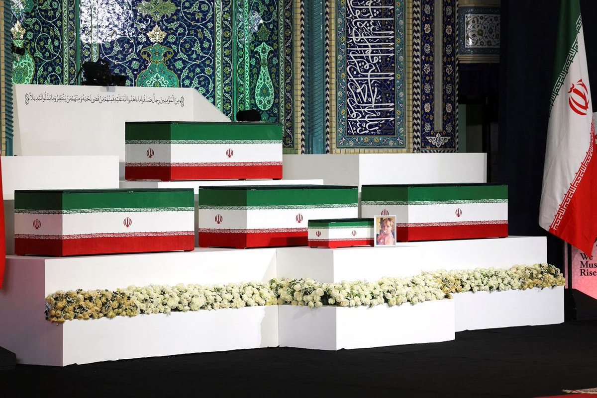 saharzaman's tweet photo. Image1: 5 coffins Khamenie’s family including his 14-month grandchild, his wife, his daughter, another teen grandchild and himself. All killed in unprovoked, unlawful bombing by US. Surviving son Mujtaba can’t attend funeral after 5 months of their killing. Security threat. (1/2) https://t.co/PKSbGssYRn