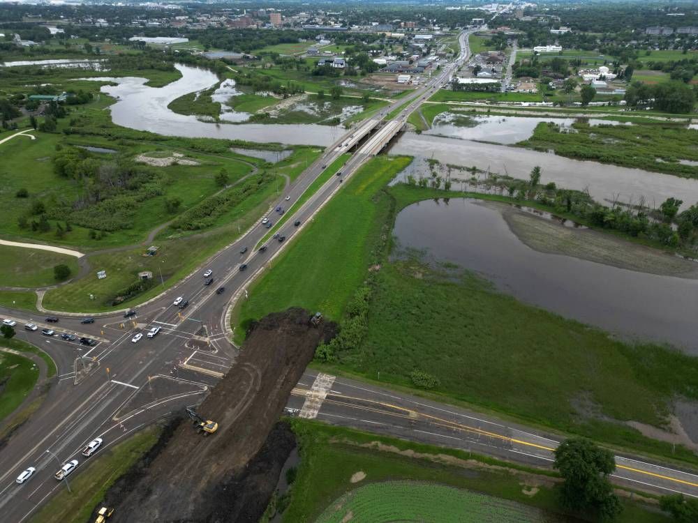 thebrandonsun's tweet photo. The City of Brandon on Friday began building a temporary dike at the intersection of Grand Valley Road at the 18th Street due to the risk of rising waters along the Assiniboine Riverm due to recent rain. https://t.co/SG71x9Qk9P #bdnmb https://t.co/coqWVgZvxB