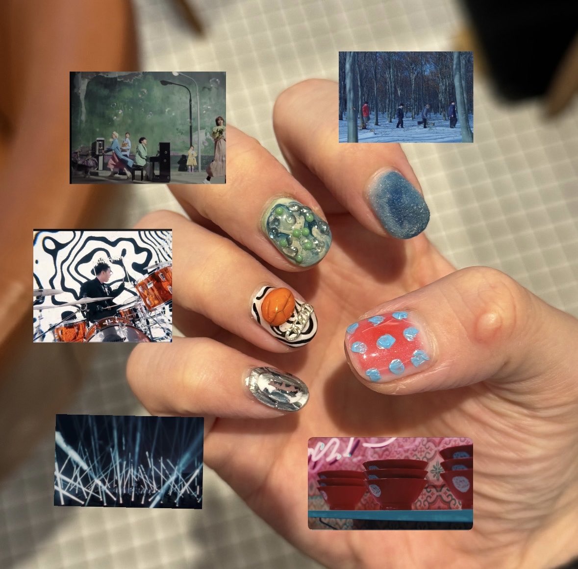 rg_hgdn's tweet photo. あとあと見て見て！！💅
今回念願の髭男の概念ネイルして参戦したんやで！！！この抽象的さが最高🌈🫶🏻
「らしさ」の文字が埋め込んでるのもお気に入り！あとC賞も当たった！！幸
#Official髭男dism  #onemantour2026 #髭男ネイル https://t.co/CSPryYYZpo