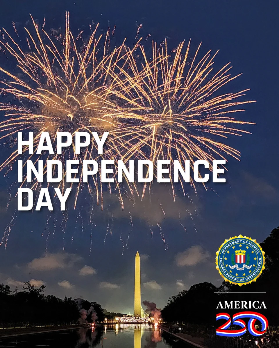 Fireworks burst over the Washington Monument at night with 'Happy Independence Day' text and FBI seal in the corner.