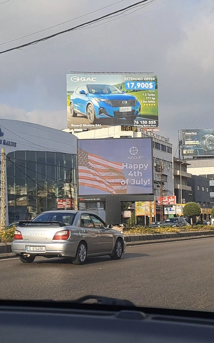 iamborat98's tweet photo. I can’t believe this shit. What is wrong with Lebanon? Why would they have such a billboard up? I can’t believe I live in a country where GAC cars are advertised on highways https://t.co/5KaqDNTsS8