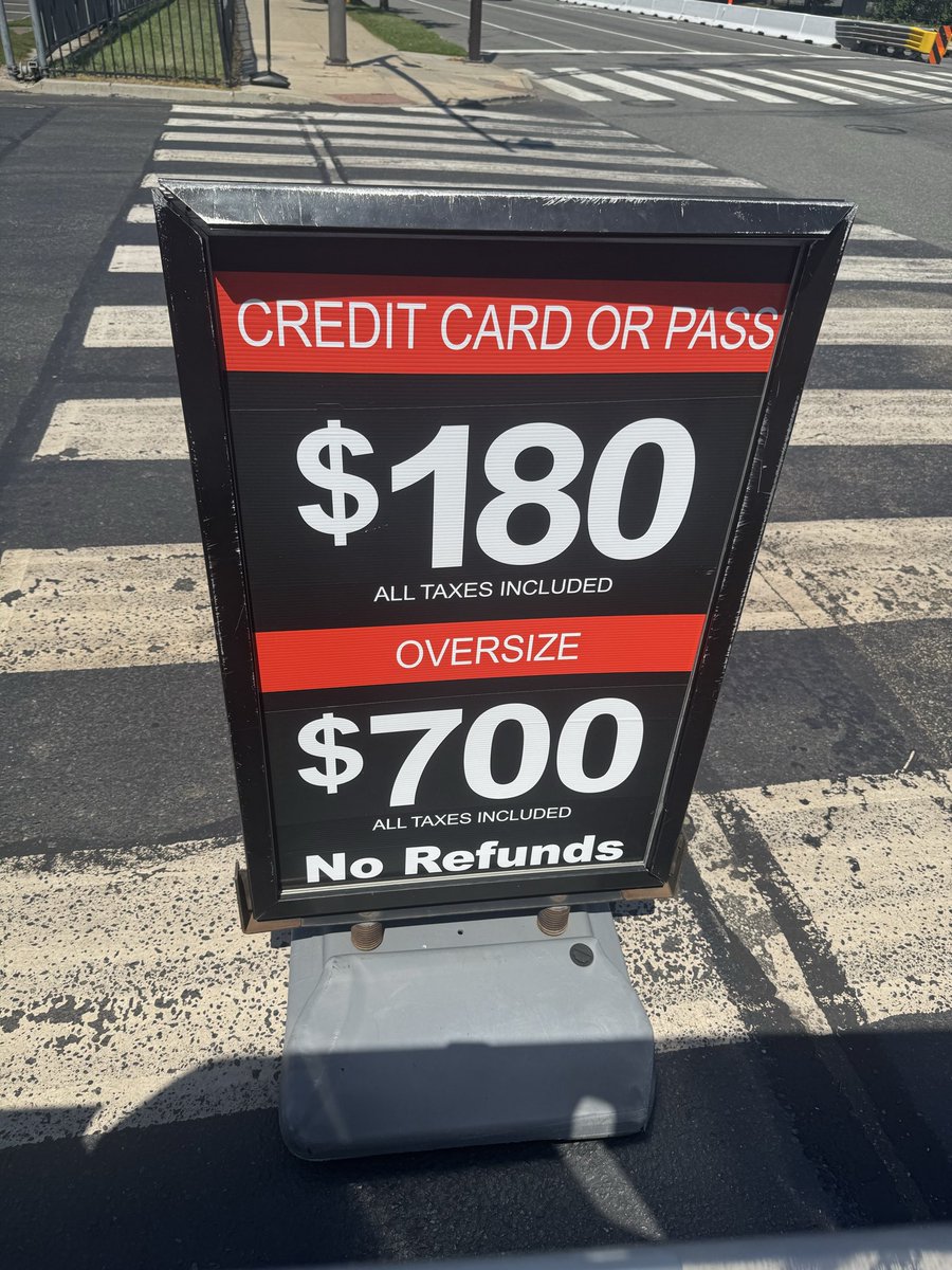 eringrugan's tweet photo. FIFA actually still raising the prices of parking, apparently. Pricing for the Round of 16 match today... https://t.co/2pgx9v2c6F