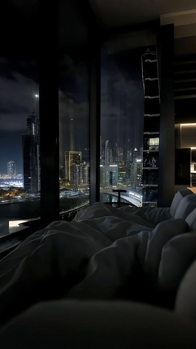 sixpackbro's tweet photo. In the velvet hush of midnight, I linger by the open bedroom window, silk sheets pooled around my waist like spilled moonlight. 

A glass of crimson wine rests in my hand, its surface catching the faint glow of distant neon, rich notes of black cherry and aged oak on every sip. https://t.co/2trvL9piyw