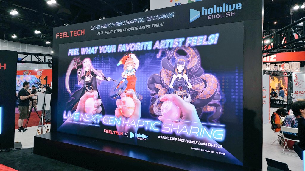 LC_Lapen's tweet photo. Just did the FEEL TECH demo at #AX2026 & the reward for participating was holding the devices up to your cheek and getting a kiss from Kiara 😳 #KFP #Hololive https://t.co/v6VHqvyyL6
