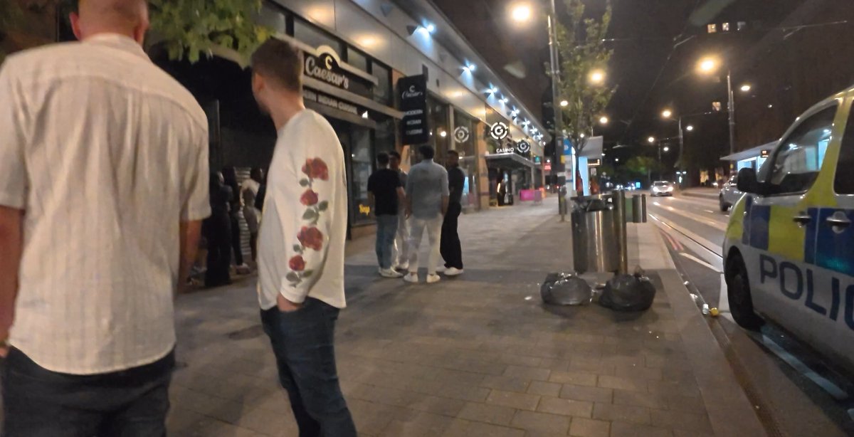 AnthNFS's tweet photo. The police van was literally parked right next to the assault as it happened. 

Stop talking so much shit. 

Drop the charges, track the three Black men who attacked him and arrest them all, and sack the female copper with the filthy mouth (she’s blind as fuck or corrupt....pick one). 

You can also sack the male police officer who got caught blatantly assaulting a handcuffed victim.

Do the right thing, you scumbag police force. Always attacking the white man in a city of foreigners.