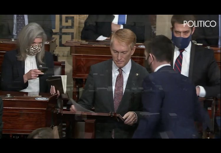 notrumppardon's tweet photo. @SenatorLankford Reminder that James “Pompous Pilate” Lankford had to be pulled away from the microphone in the middle of his January 6 sedition speech: https://t.co/OXlwTagYAk