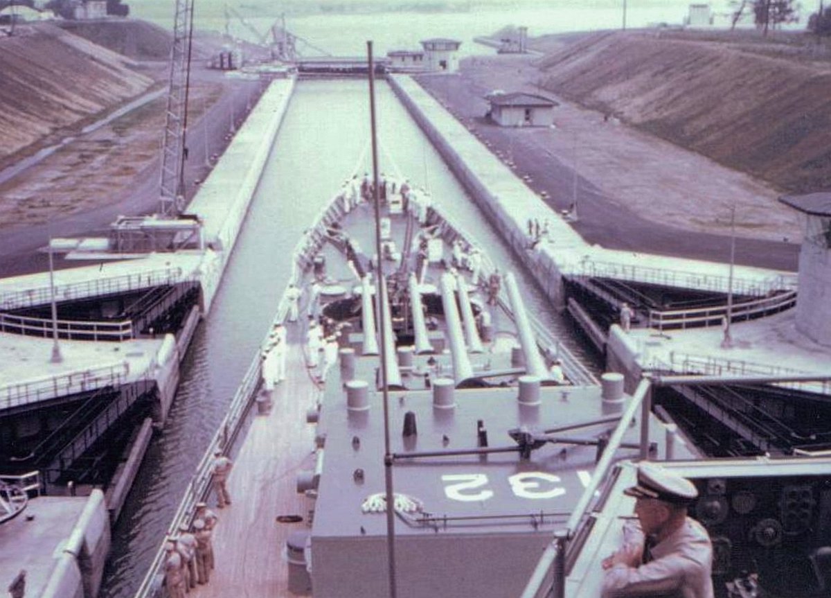 DramaWarship's tweet photo. Date: Late June 1959. Location: Massena, NY, USA. Event: Heavy cruiser Macon of the USN Task Force 47 is navigating locks of the recently constructed St. Lawrence Seaway (Operation Inland Seas). Note commanding officer Joseph Wylie, Jr. on the bridge. Photo by William Phillips. https://t.co/OYhZUQpRhU