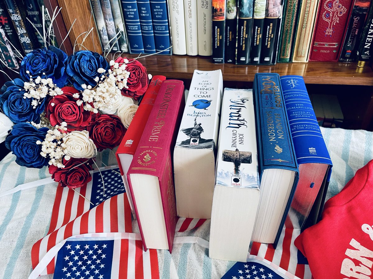 ATroubledGreen's tweet photo. #4thofJuly but you’re a book girl. That beautiful flower bouquet is wood so I’ll get to enjoy them next year. My incredible hubby surprised me with them last night because I’d been eyeing them every time we went to the grocery store. #250thamerica https://t.co/JG1ZIdR0pm