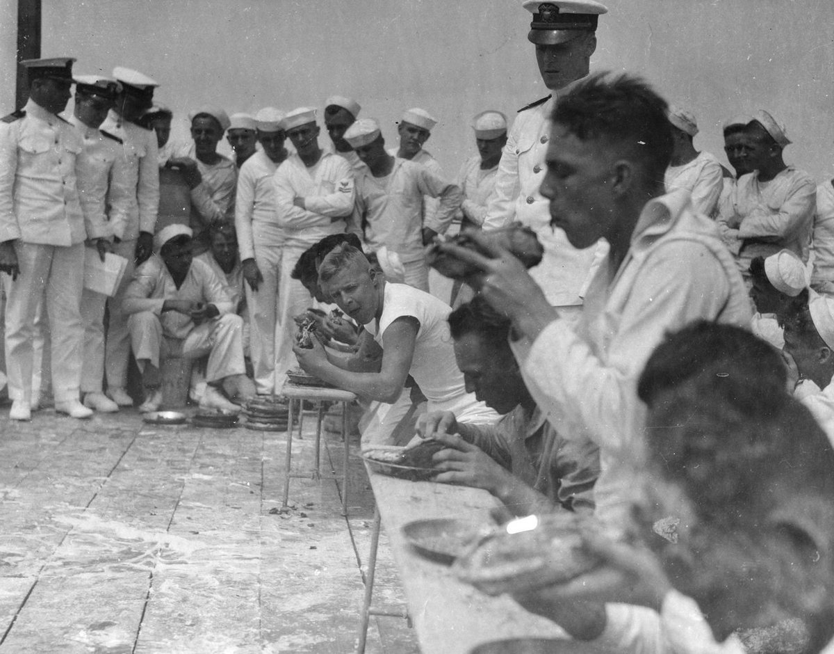 thegeneralboard's tweet photo. Sailors aboard the battleship USS Maryland (BB-46) competing In a pie eating contest in August of 1922.

Sadly there is no record of who won, the type of pie, and the number consumed. https://t.co/BBNCVMSnDR