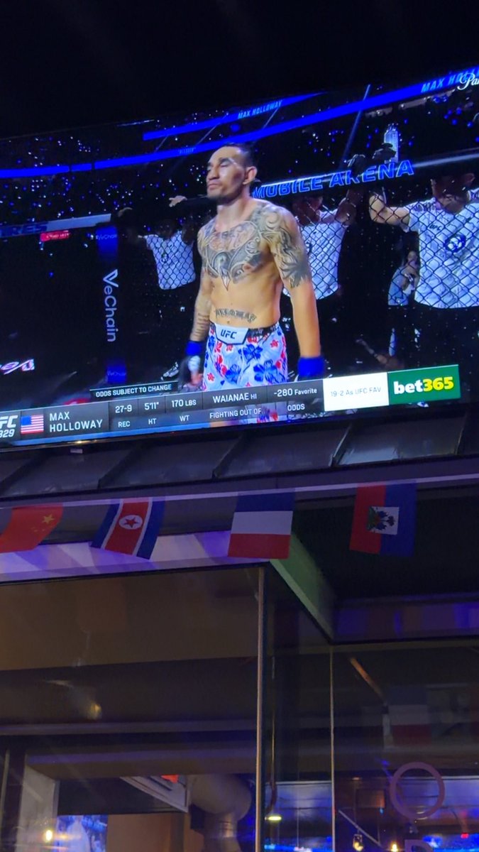 ryanbraunn's tweet photo. North Korea flag at the bar, don’t know what to feel abt this https://t.co/lJ0Id2W9gb