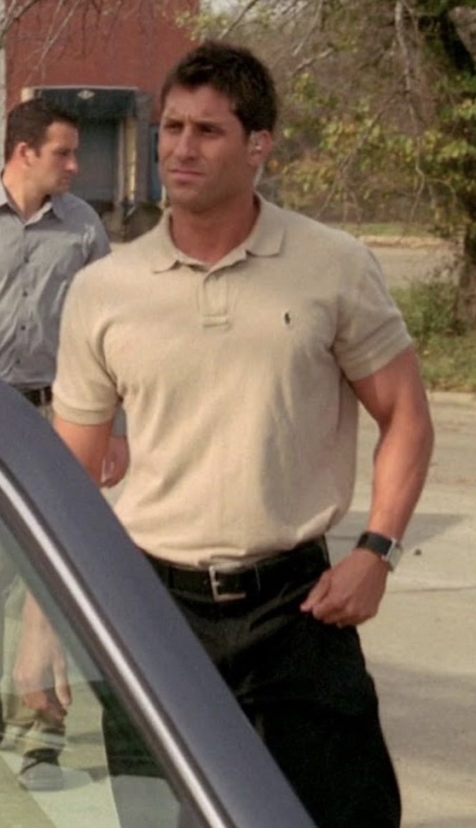 BraveReport's tweet photo. Dan Flood, head of security at TPUSA, wasn’t just a model either. He also seems to have been an actor. Of course.

Here is he playing A SECURITY GUARD of all things in Prison Break Season 3, Episode 13.