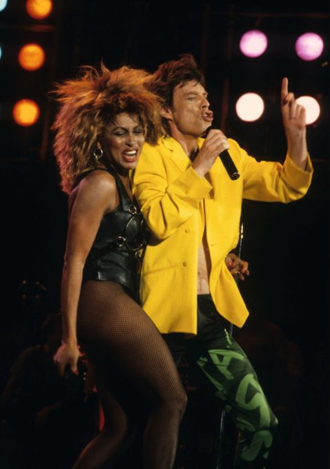 crockpics's tweet photo. Tina Turner and Mick Jagger delivering an electrifying duet at the historic Live Aid concert at JFK Stadium in Philadelphia, July 13, 1985. Photo by Mark Weiss. 

The two had been friends and collaborators for years, with Tina having taught Mick some of his signature dance moves back in the early days. Their Live Aid set reached an absolute fever pitch when Mick famously tore away Tina's skirt on stage, creating a pop culture moment that people still talk about decades later. 

What was your favorite performance of Live Aid?👇️