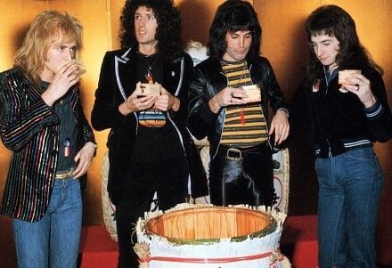 crockpics's tweet photo. Queen participating in a traditional 'Kagami biraki' sake barrel ceremony at the Pacific Hotel in Tokyo, March 30, 1976. Phone by Koh Hasebe. 

Kagami biraki, which literally means "opening the mirror." In Japan, breaking open a large, round wooden barrel of sake and drinking it from small wooden boxes called masu is a beautiful tradition used to celebrate milestones, harmony, and good fortune.
