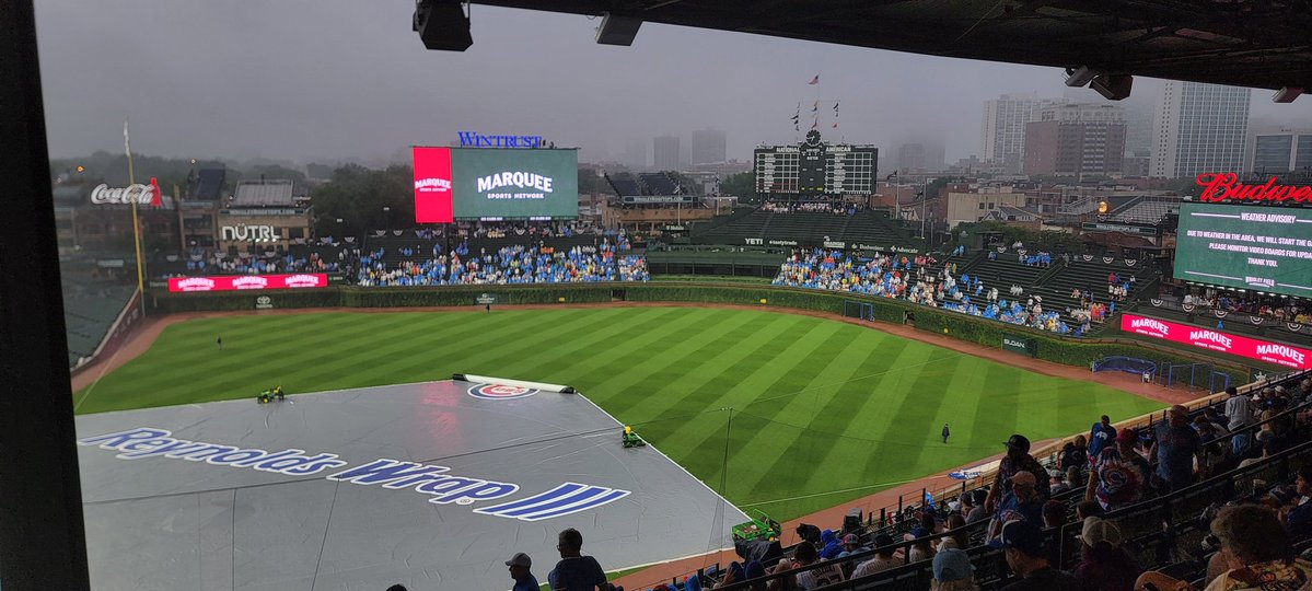 JPWeld319's tweet photo. Rain delay
At least our seats are under the awning! 
Nice breeze blowing thru! https://t.co/FJQhXt5hn5